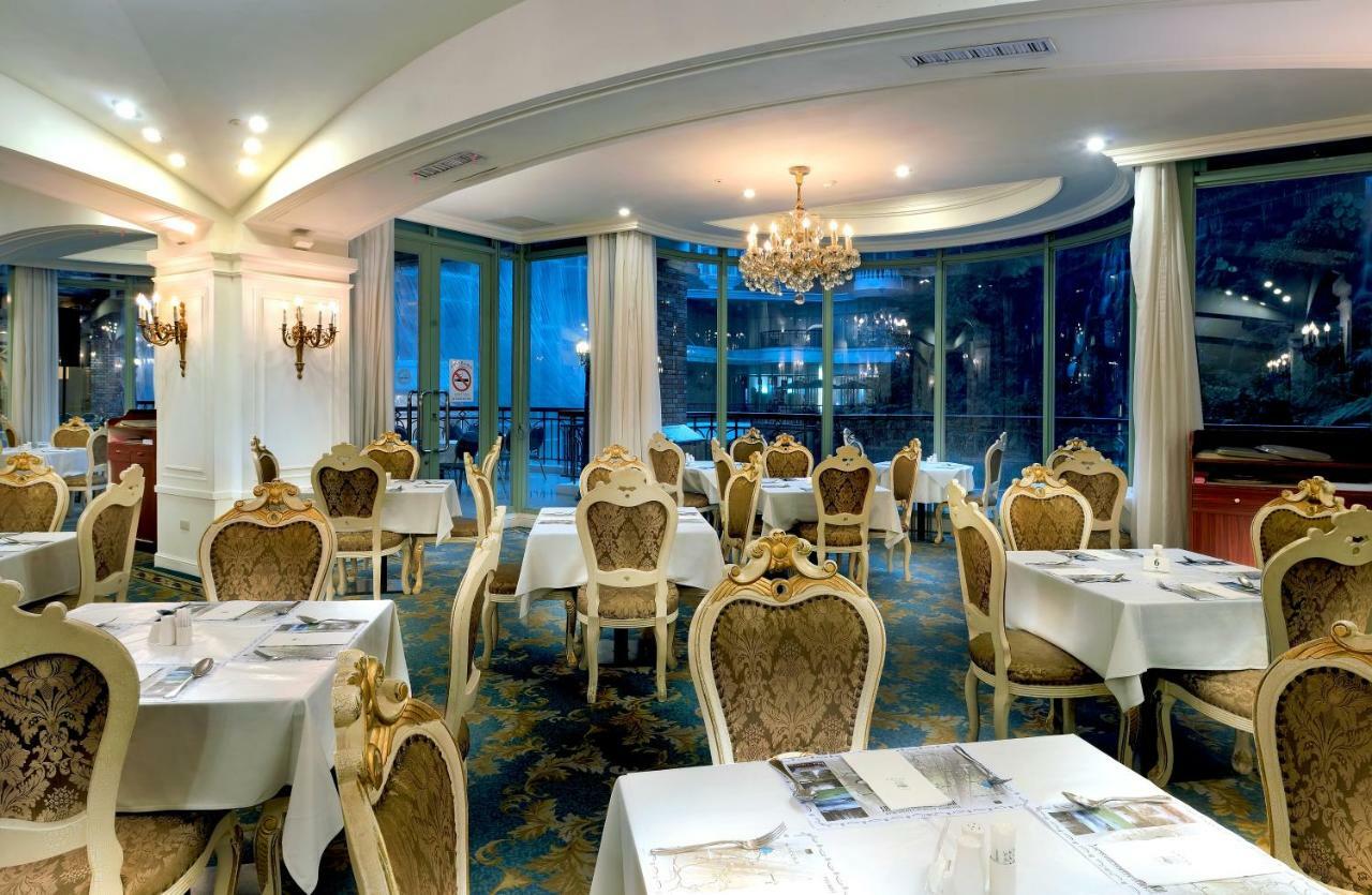 לוגו Le Midi Hotel Chitou מראה חיצוני תמונה